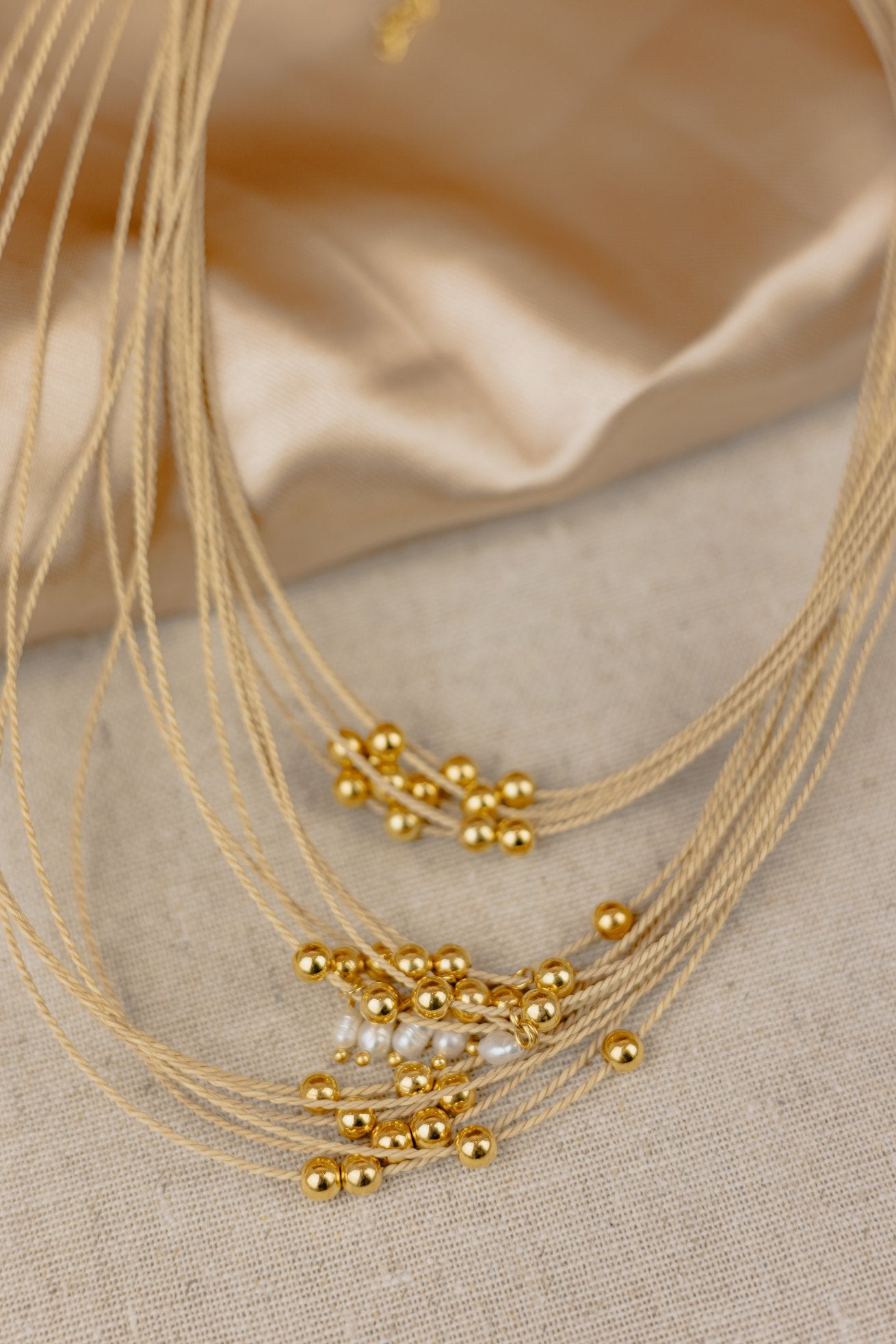 Buriti Palm Multi-Strand Necklace with Gold & Pearl Cluster