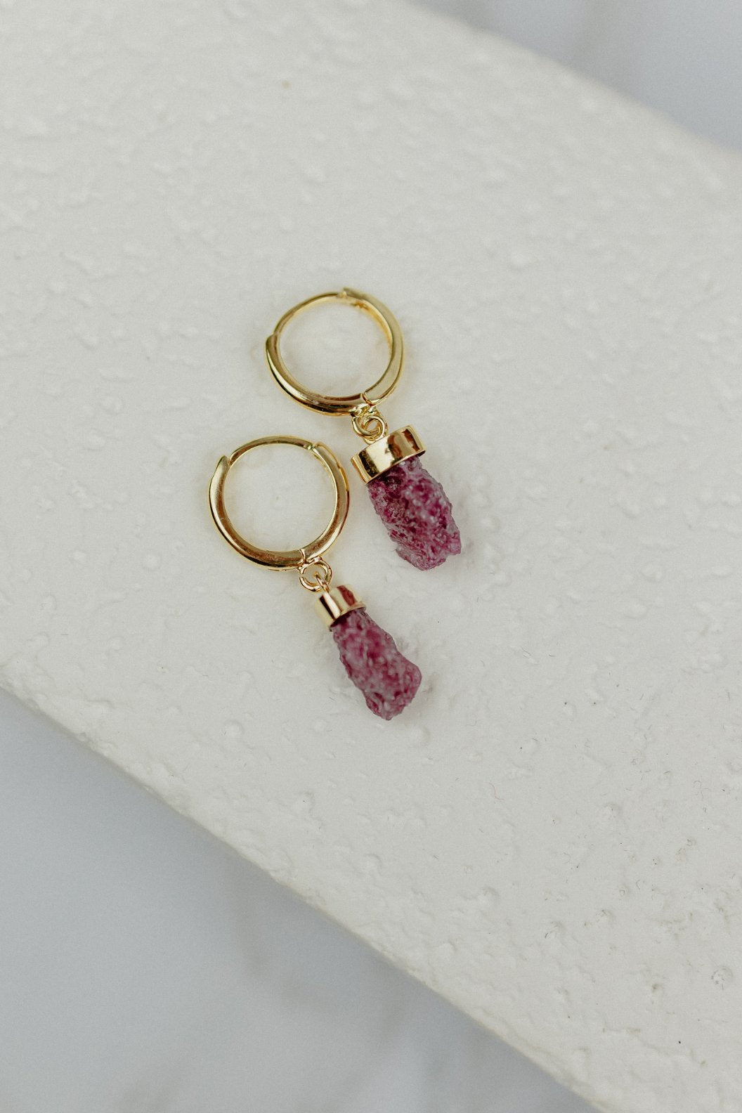 Raw Ruby Huggie Hoop Earrings (Gold)